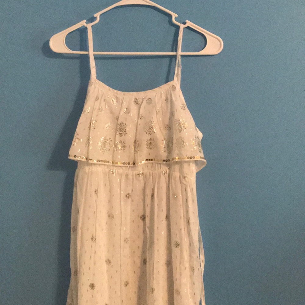 White and gold dress.